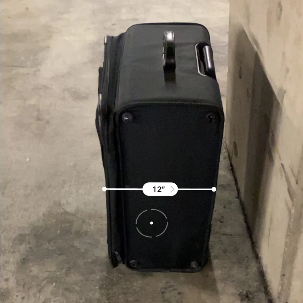 TUMI Check On Suitcase